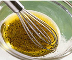 Активно перемешивая, вмешать постепенно масло.