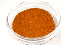 Пряная смесь специй светло-красного цвета с включением мелко-помоленных пряных трав